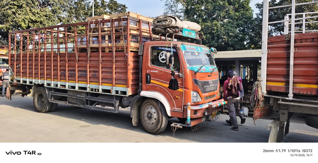 Loaded Eicher open-body truck used for full truck load commercial transport